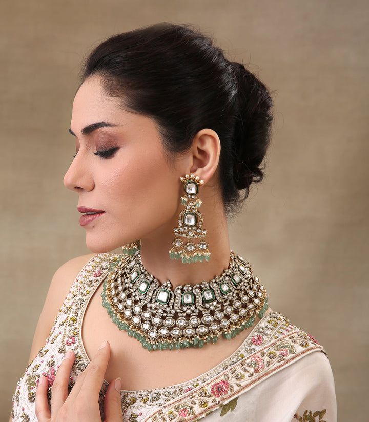 CHAARVI GREEN ANTIQUE GOLD FINISH POLKI NECKLACE